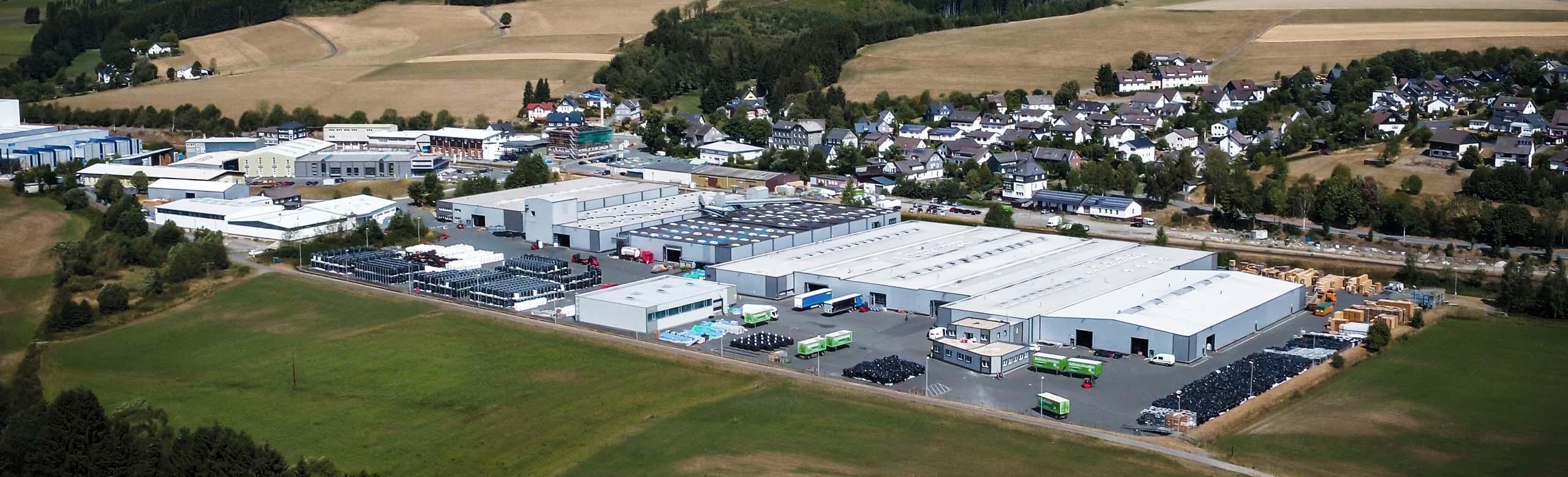 Luftaufnahme des Produktionsstandortes in Bad Berleburg-Raumland Luftaufnahme des Produktionsstandortes in Bad Berleburg-Raumland